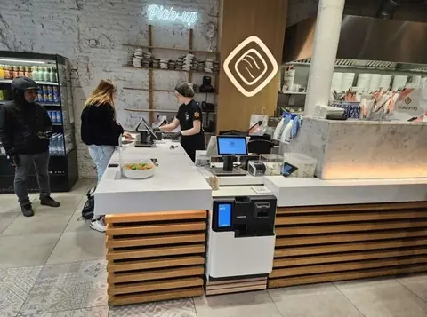 InPay intégré dans une caisse de supermarché